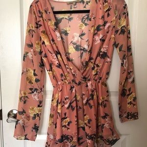 PINK FLORAL LONGSLEEVE ROMPER - size M